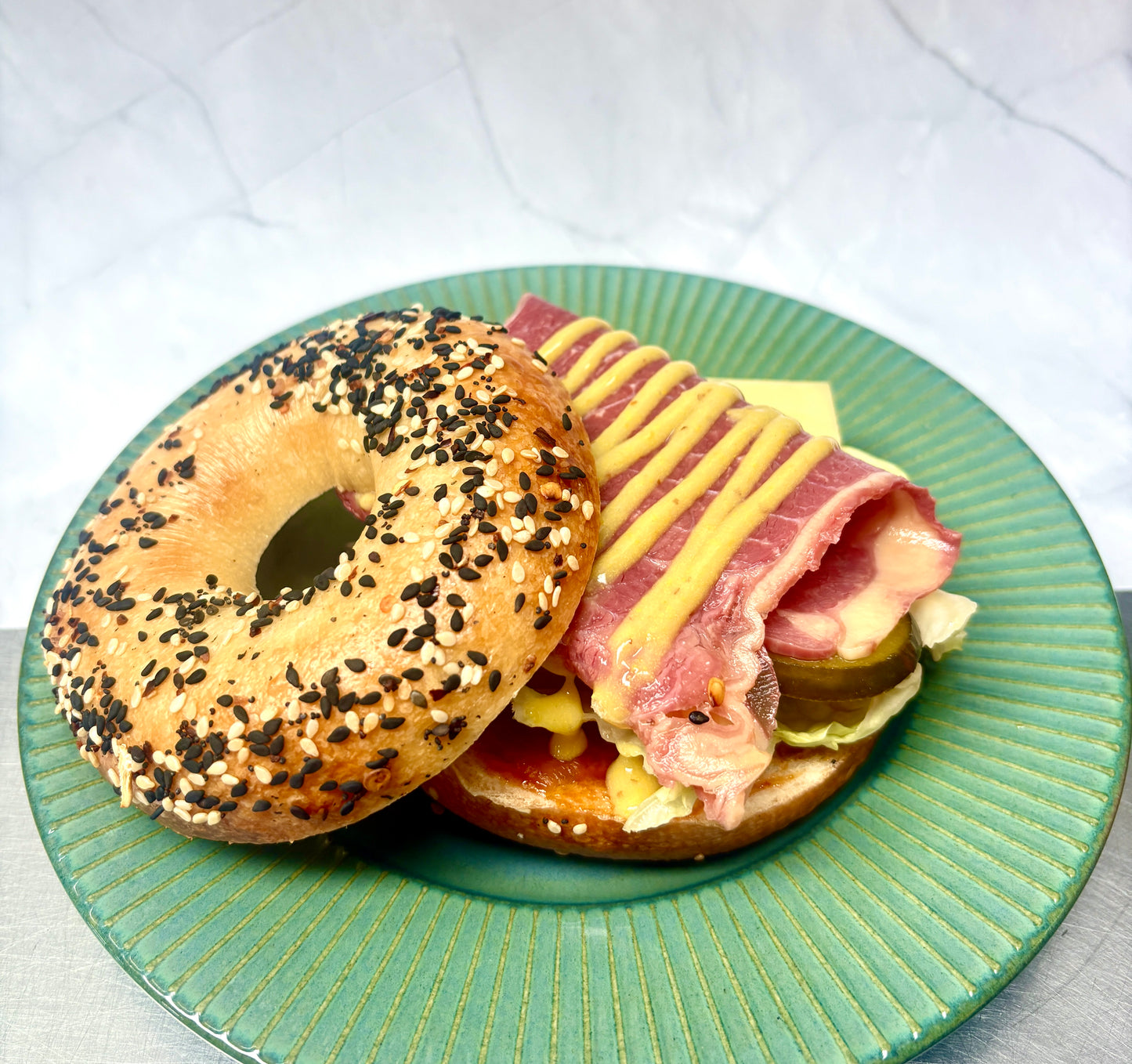 CORNED BEEF WITH CHEDDAR CHEESE BAGEL SANDWICH